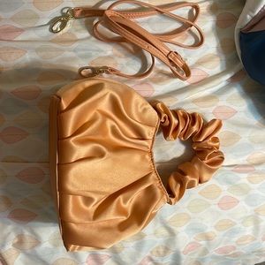 mini orange/tan hand purse from target